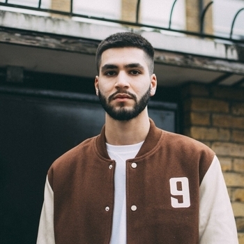 Артист Mishlawi